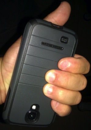 Photo of the test phone held in the hand, no Bodywell card attached to the back